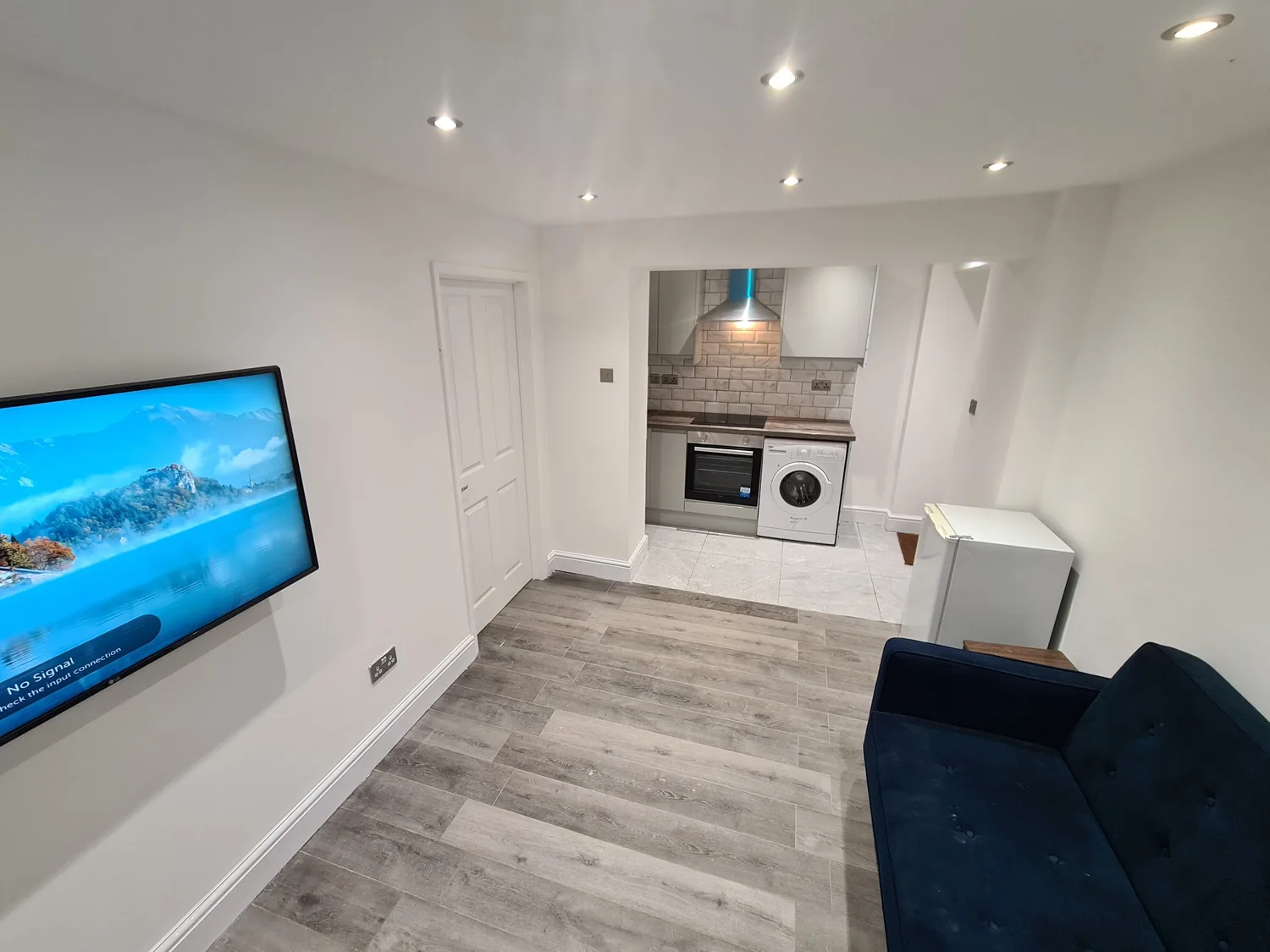 Bright open-plan kitchen and living area at Arthur Street